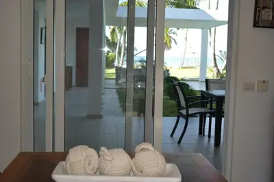 a room with a table with three balls of yarn on it at Villa Brise de Mer in Las Terrenas