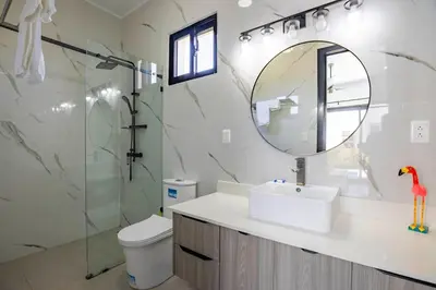 a bathroom with a sink and a mirror at Sosua Ocean Village, Villa 9 Campo Del Mar , IV in Sosúa