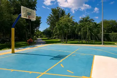 an outdoor basketball court with a hoop at Iberostar Selection Hacienda Dominicus - All Inclusive in Bayahibe