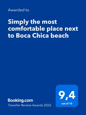 a screenshot of a cell phone with at Simply the most comfortable place next to Boca Chica beach in Boca Chica