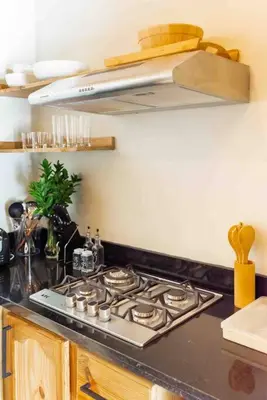 a kitchen with a stove top in a kitchen at Hacienda La Huerta, Puerto Plata in San Felipe de Puerto Plata