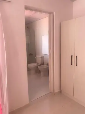 a bathroom with a toilet and a sink at Residencial Lucy in Boca Chica