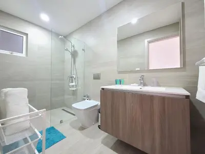 a bathroom with a sink and a toilet and a shower at Beauty Apartment Coral Village 2 close to the beach in Punta Cana