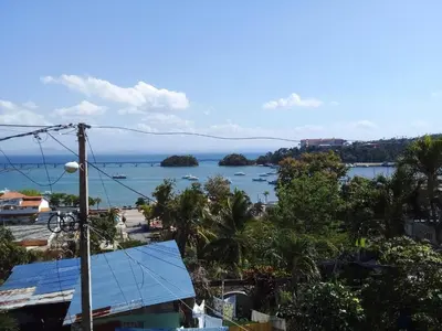 a view of the ocean from a city at Appart-hotel Veras Samana No-14 in Santa Bárbara de Samaná