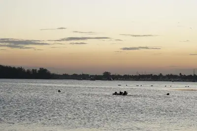 a group of people in a boat in the water at Villa Gumio Studio Apt - 7 minutes walk to Boca Chica Beach apts in Boca Chica