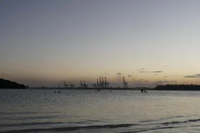 a large body of water with a group of people in it at Villa Gumio Studio Apt - 7 minutes walk to Boca Chica Beach apts in Boca Chica