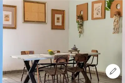 a dining room with a table and chairs at Room in the Colonial Zone in Santo Domingo