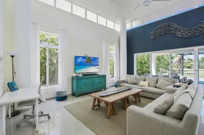 a living room with a couch and a table at Stunning 3-Bedroom Villa with Pool, Jacuzzi and Maid near Bavaro Beach in Punta Cana