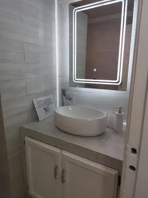 a bathroom with a sink and a mirror at Villa Preciosa in Bayahibe