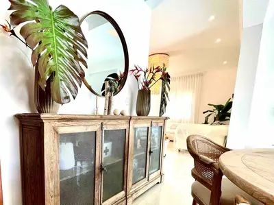 a mirror on top of a cabinet with plants on it at LUXURY_VIP_Villa_LifeStyle puerto plata in San Felipe de Puerto Plata