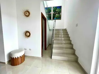 a staircase in a room with a stair case at LUXURY_VIP_Villa_LifeStyle puerto plata in San Felipe de Puerto Plata
