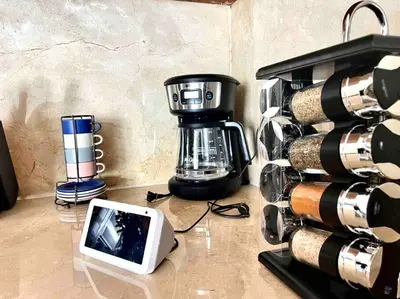 a coffeemaker and a coffee maker on a counter at LUXURY_VIP_Villa_LifeStyle puerto plata in San Felipe de Puerto Plata