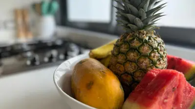 a bowl of fruit sitting on a kitchen counter at 3 Bedroom Beach Villa With Parking in Las Terrenas