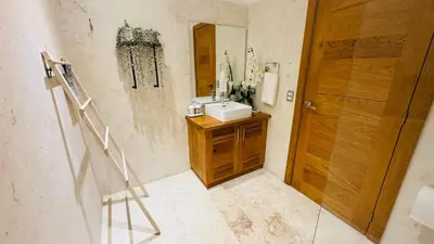 a bathroom with a sink and a mirror at 3 Bedroom Beach Villa With Parking in Las Terrenas