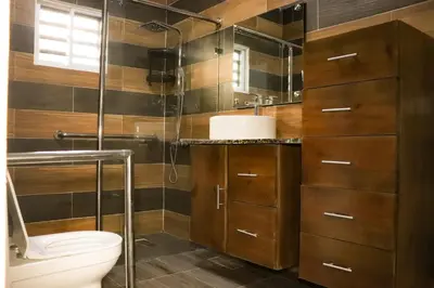 a bathroom with a toilet and a shower at Apart hotel Costa Verde Exclusivo y Seguro #5 con cama Queen in Las Galeras