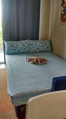 a bed in a room with a pillow on it at Casa Larimar 214 - Vibe Residence in La Laguna