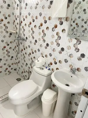 a bathroom with a toilet and a sink at Apartamentos felix Las terrenas in Las Terrenas