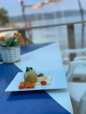 a plate of food sitting on a table at La Isla Bonita in Punta Rucia