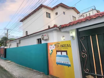 a building with a colorful mural on the side of it at Casa angelina in Sosúa