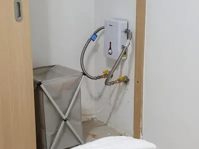 a water hose is hooked up to a sink at Elegant and confortable close to Boca Chica Beach in Boca Chica