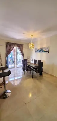 a dining room with a table and chairs at Pine Tree Entire House 2B Gated Com in Higuey