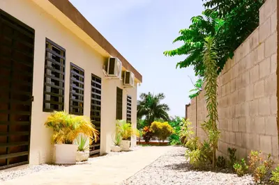 a building with plants on the side of it at Apart hotel Costa Verde,#1 Exclusivo y seguro con cama Queen in Las Galeras