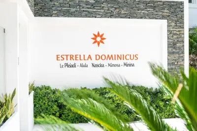 a sign for the entrance to esfila domingos at Paradise Dream Dominicus in La Laguna