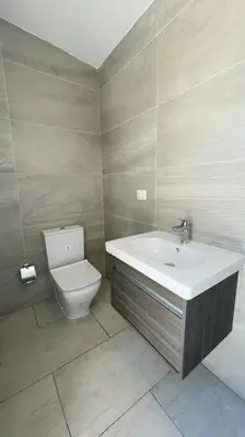 a bathroom with a sink and a toilet at Beautiful Penthouse with private elevator in Hard Rock Golf in Punta Cana