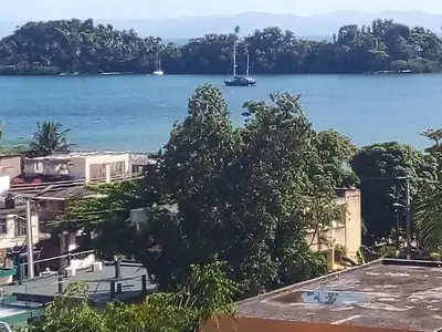 a view of the water from a house at The Beauty of samana in Santa Bárbara de Samaná
