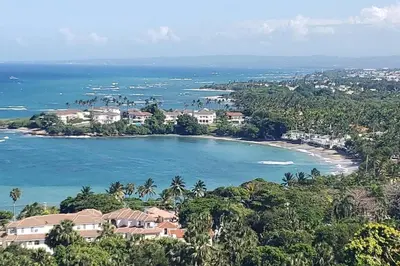 a view of a beach with houses and the ocean at Heavenly View in San Felipe de Puerto Plata