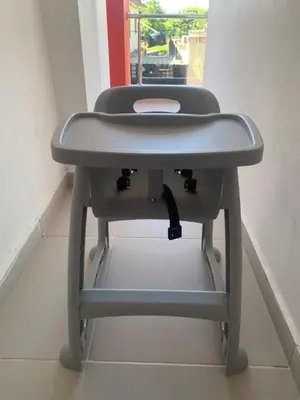 a gray bench in a room with a window at Plataview Apartahotel apt 3C in Monte Plata
