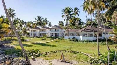 a view of a resort with palm trees at Las Canas Beach Retreat in Gaspar Hernández