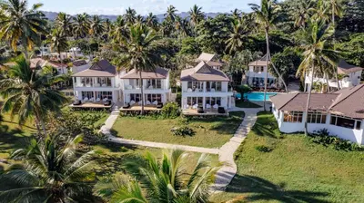 an aerial view of a resort with palm trees at Las Canas Beach Retreat in Gaspar Hernández