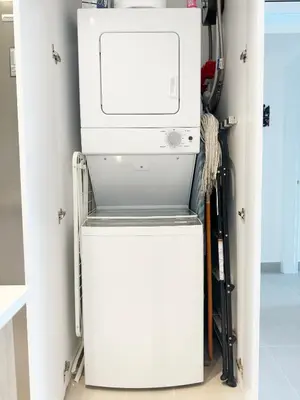 a washer and dryer in a room at Tropical Relaxing 2 Bedroom Unit with picuzzi in Punta Cana