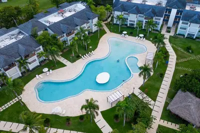 an aerial view of a pool at a resort at Riviera Azul -2 Hab con vista a la Piscina - cash only or paypal in San Felipe de Puerto Plata