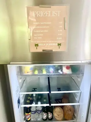 a refrigerator filled with lots of food and drinks at Villa Clarissa No. 8 in Las Terrenas