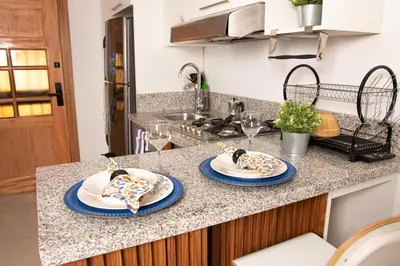 two plates of food on a kitchen counter at Casa de Nini in Santo Domingo