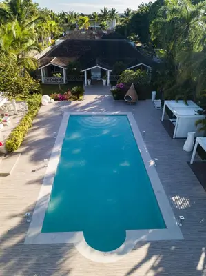 an overhead view of a swimming pool on a patio at TRACADERO Beach Club & Holidays Rentals in Bayahibe