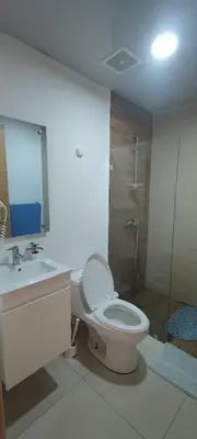 a bathroom with a toilet and a sink and a shower at Boca del Mar Residence, Boca Chica in Boca Chica