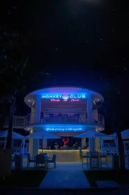 a building with blue lights on it at night at Exclusive Villa * private Beach and Housekeeping in Punta Cana