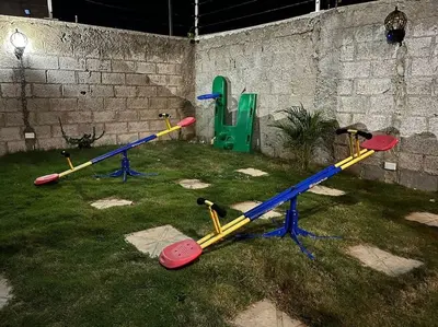 a group of baseball bats sitting on the grass at Villa Familiar con Piscina cerca Av Ecológica in La Ureña
