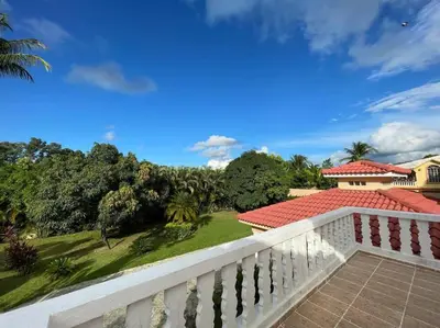 a view from the balcony of a house at Luxury Villa Classic style, 7 minutes from the beach in Sosua in San Felipe de Puerto Plata