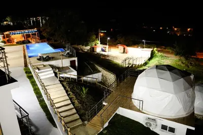 an aerial view of a house with a tent at Hotel Don Bululo Camping Lodge in Punta Rucia