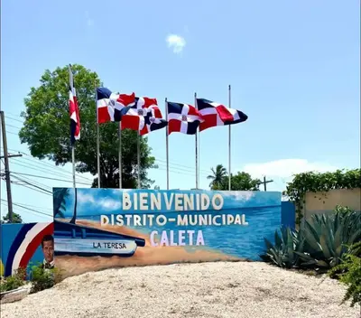 a sign for the bernivino diplomatic consulate with flags at Cielo de cierro-Apartment with Jacuzzi, 2 minutes from the beach in La Romana