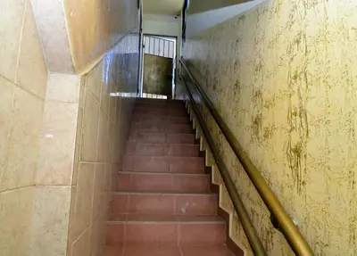 a staircase in a building with a stair case at Apartamento moderno de una habitación in San Pedro de Macorís