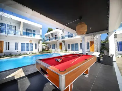a pool table in the middle of a house at 8br Private Villa In Sosa - 2 Mins From Nightlife in Sosúa