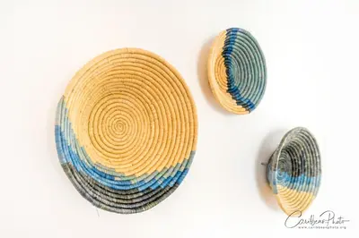 two straw hats are sitting on a white background at Estrella Dominicus deluxe Apartment in La Laguna