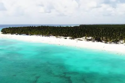 an aerial view of an island in the ocean at Caribbean Retreat at Cana Bay Golf Residence in Punta Cana