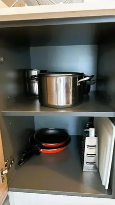 a pot and pans on a shelf in a kitchen at Beautiful Star of the Caribbean - Apartment Estrella Dominicus Bayahibe in La Laguna