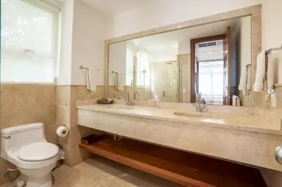 a bathroom with a large sink and a toilet at Wonderful 1-BR apartment at Casa de Campo in El Infiernito